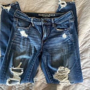 Blue distressed jeans